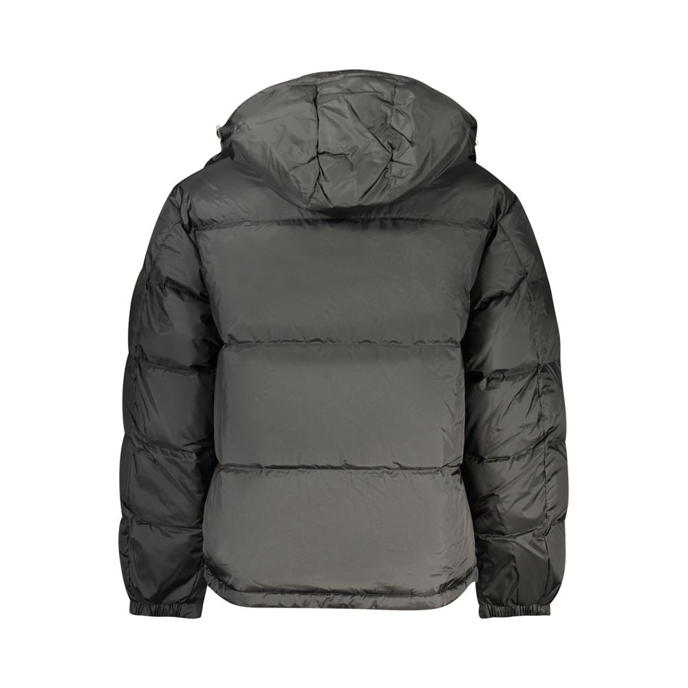 Veste pour homme Tommy Hilfiger en polyester noir, style décontracté avec fermeture éclair et col montant.