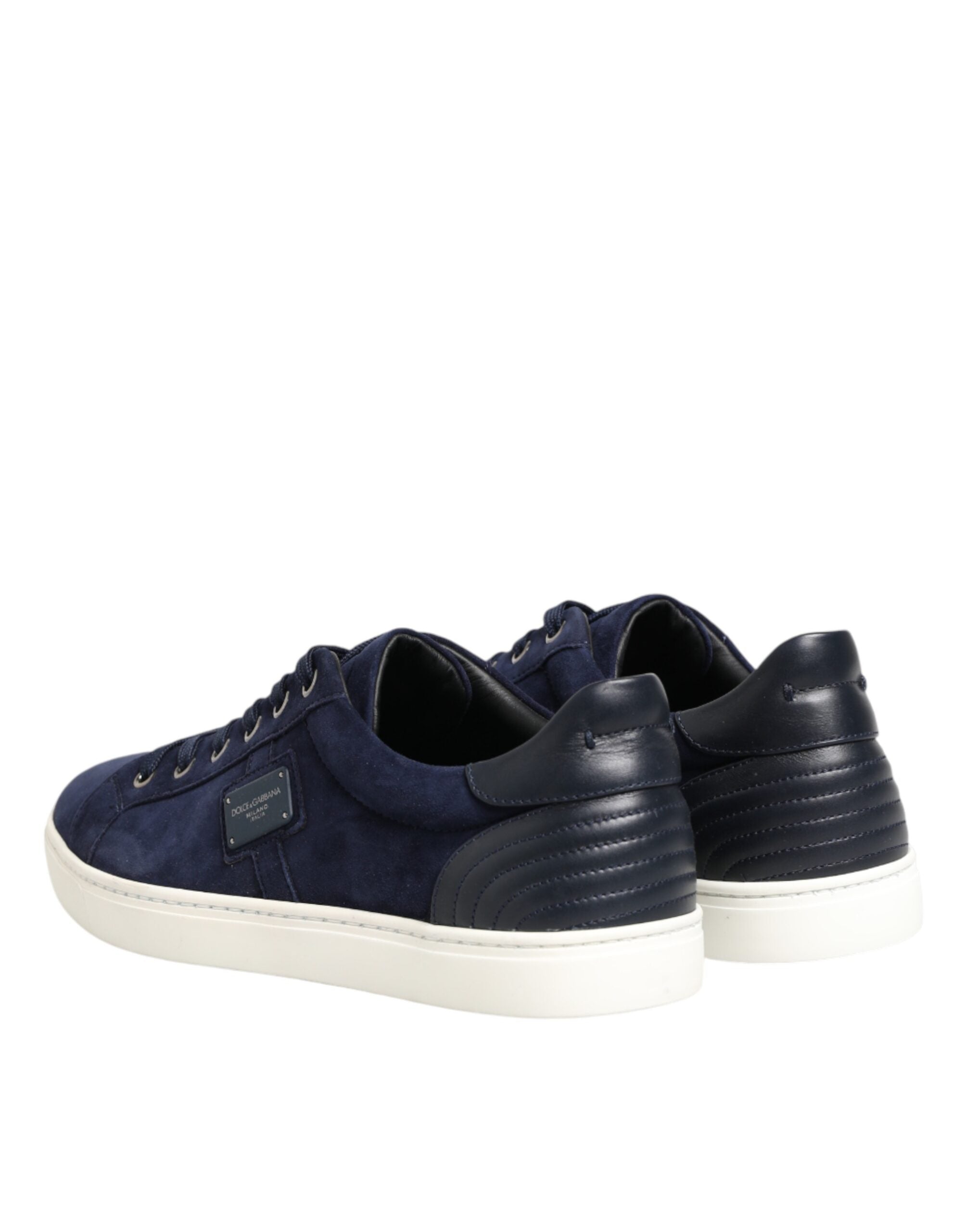 Chaussures sneakers basses en cuir et daim bleu Dolce & Gabbana, profil visible avec lacets et semelle blanche.
