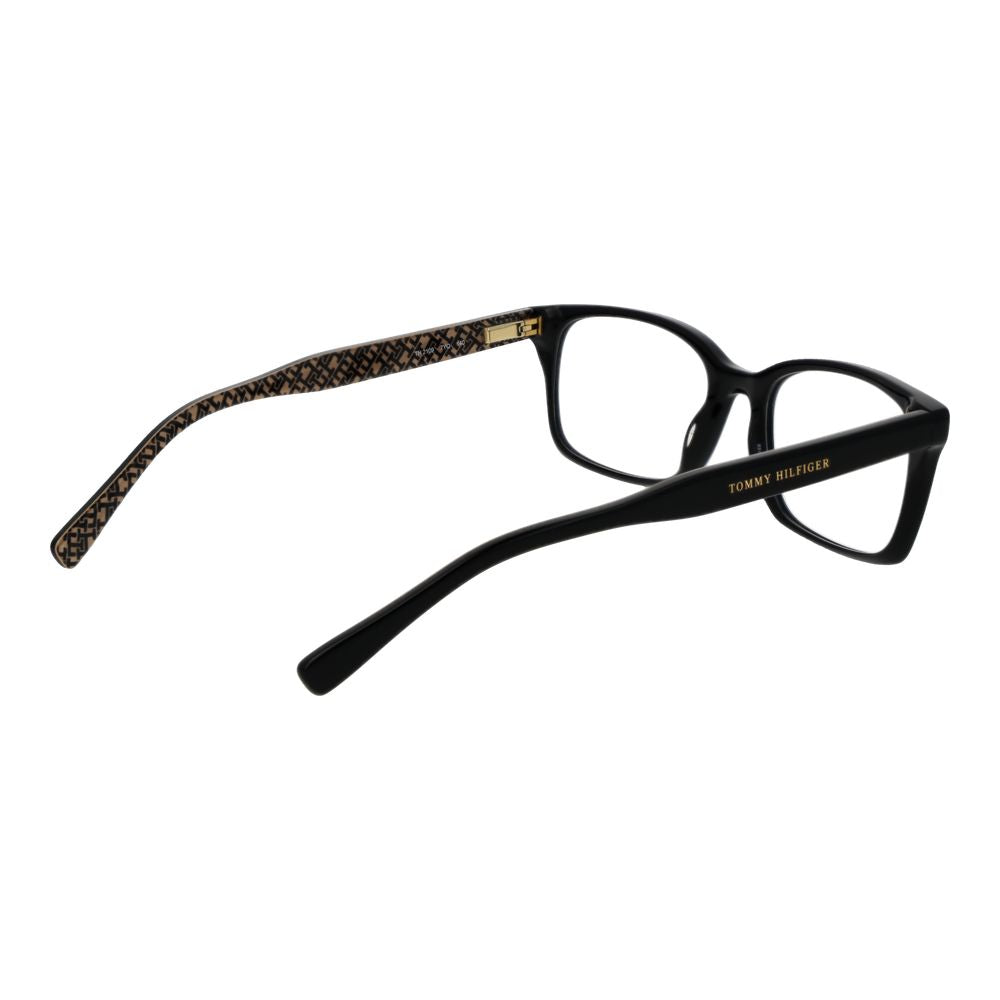 Lunettes en acétate noires Tommy Hilfiger avec monture élégante visibles sur l'image.