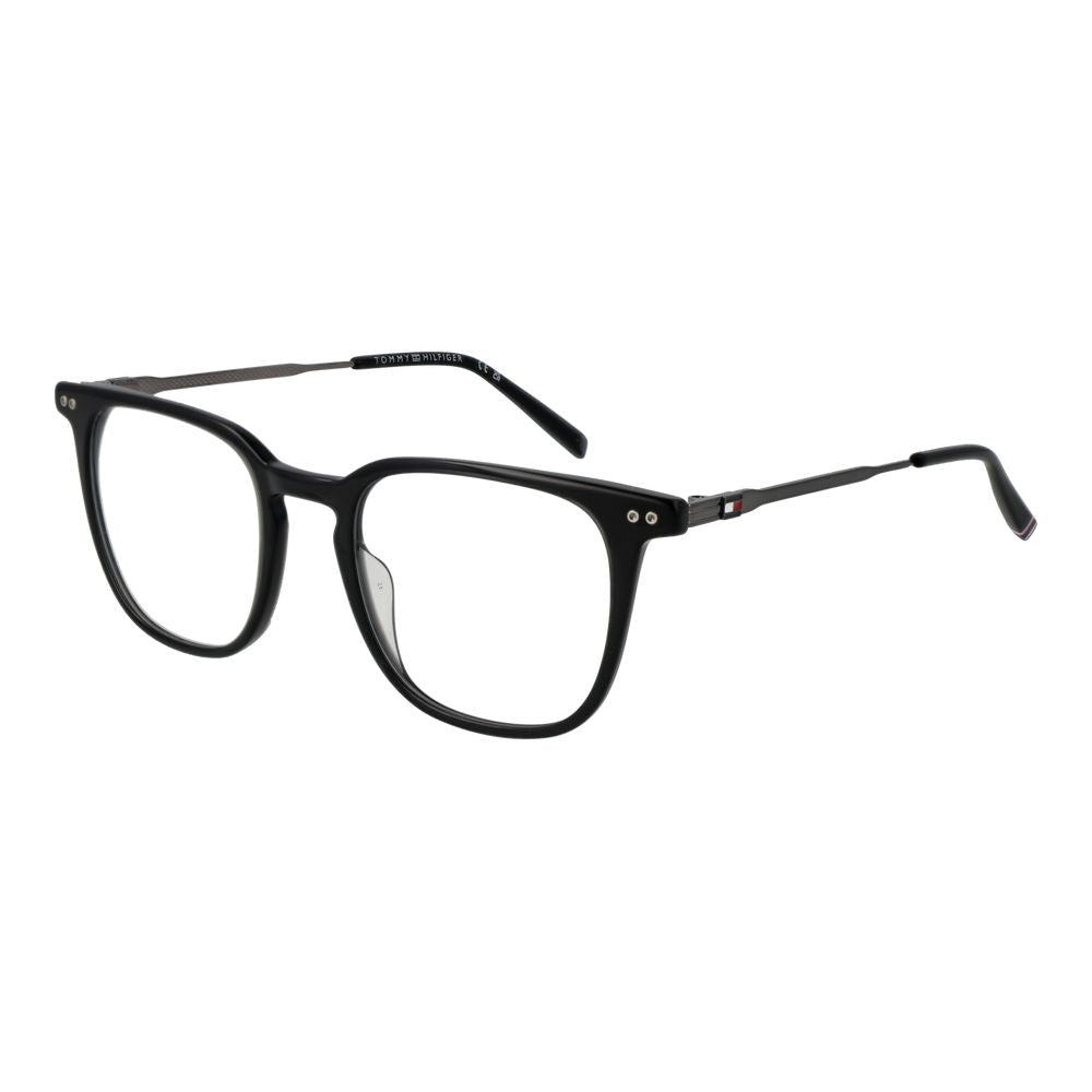 Lunettes Tommy Hilfiger en acétate noir avec cadre élégant et moderne, visibles en gros plan sur l'image.