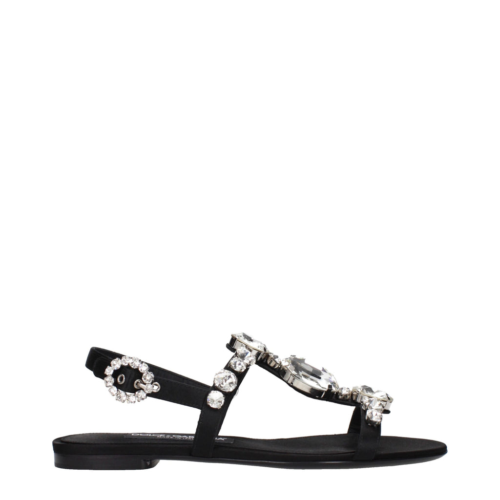 Sandales plates en satin noir de Dolce & Gabbana, élégantes chaussures plates pour femmes, avec finition sophistiquée.