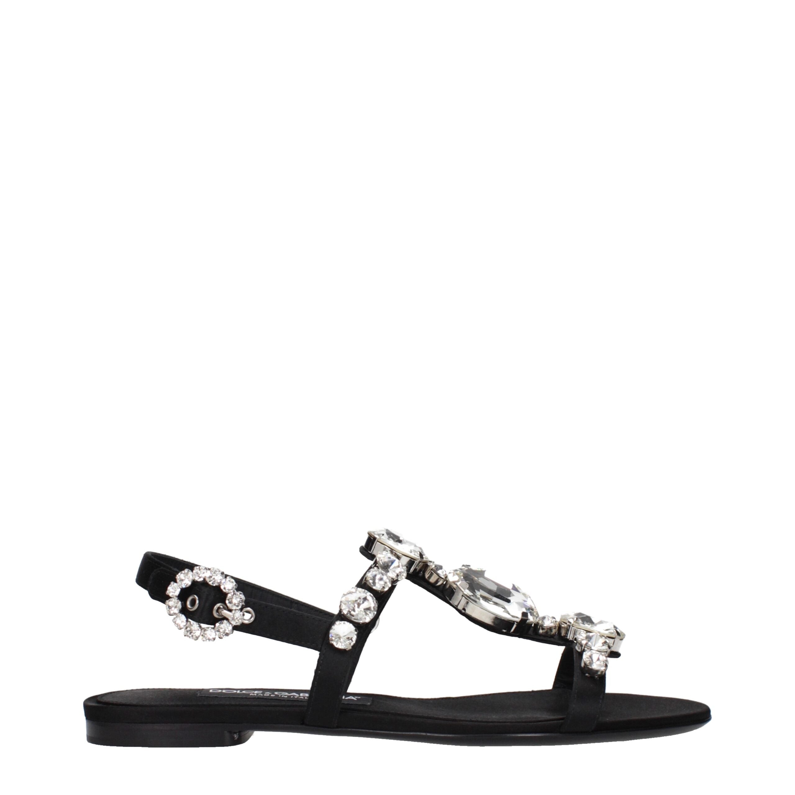 Sandales plates en satin noir de Dolce & Gabbana, élégantes chaussures plates pour femmes, avec finition sophistiquée.