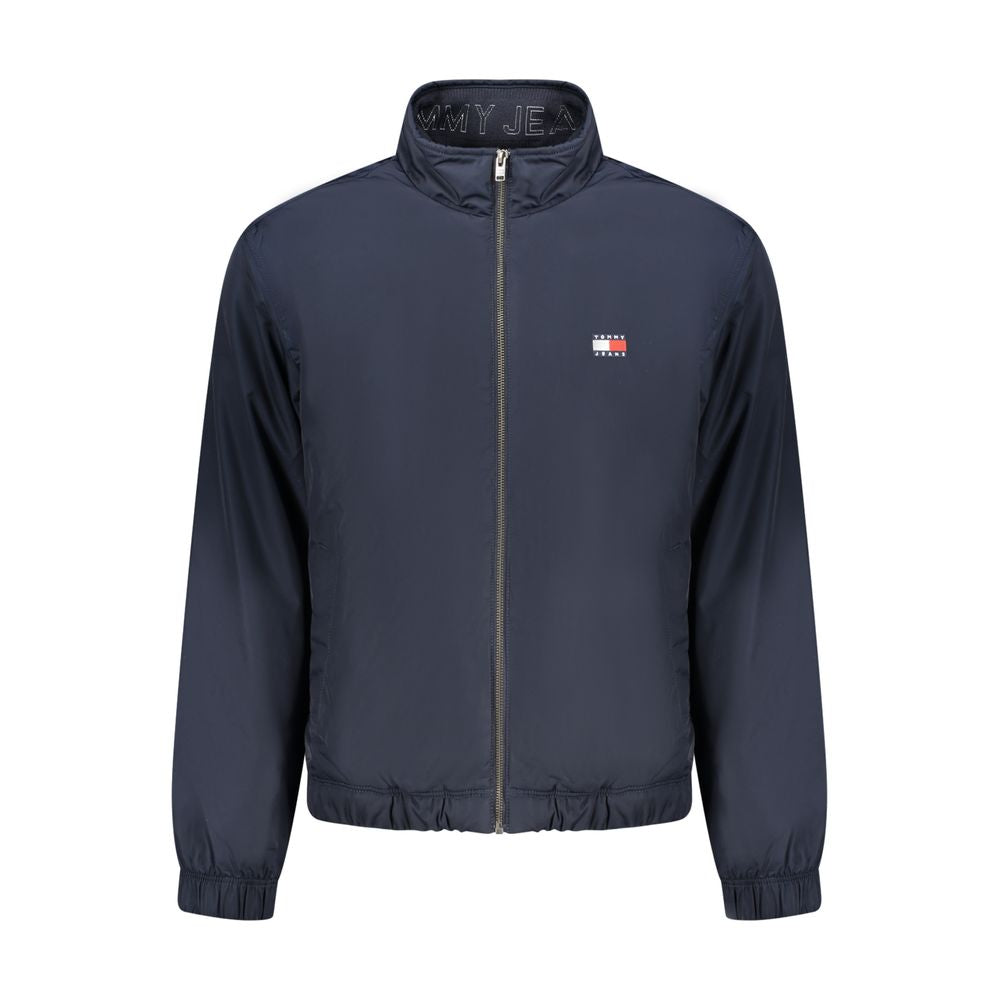 Veste en polyester bleue pour homme de la marque Tommy Hilfiger, vue de face avec fermeture éclair et col côtelé.