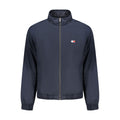 Veste en polyester bleue pour homme de la marque Tommy Hilfiger, vue de face avec fermeture éclair et col côtelé.