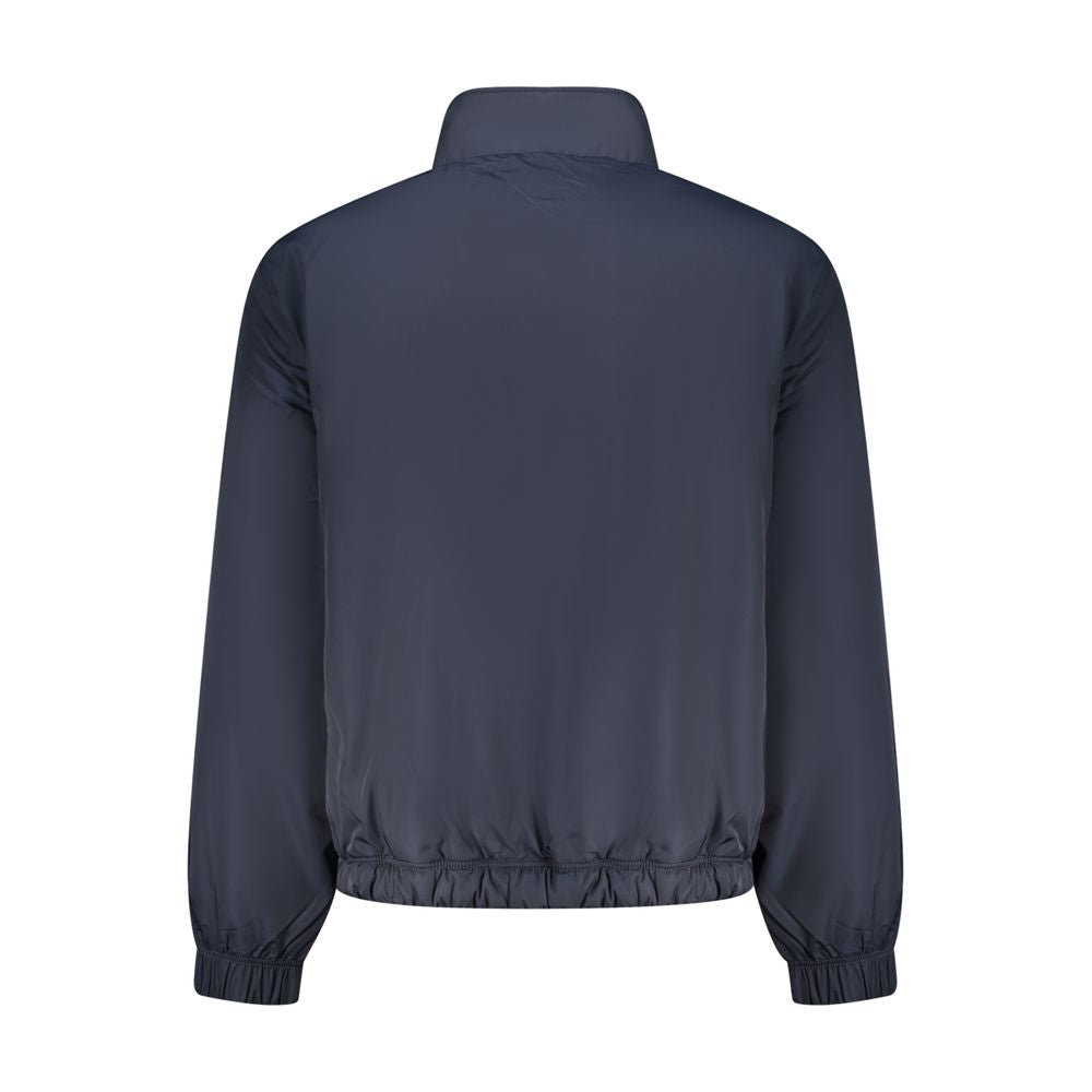Veste en polyester bleue pour homme de la marque Tommy Hilfiger, style décontracté avec fermeture éclair et col montant.