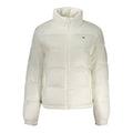 Veste blanche en polyester pour femmes de la marque Tommy Hilfiger, coupe élégante et détails modernes visibles sur l'image.