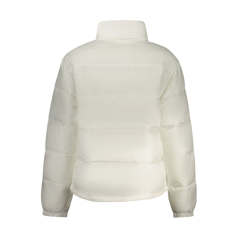 Veste blanche en polyester pour femme de la marque Tommy Hilfiger, coupe classique avec logo visible sur la poitrine.