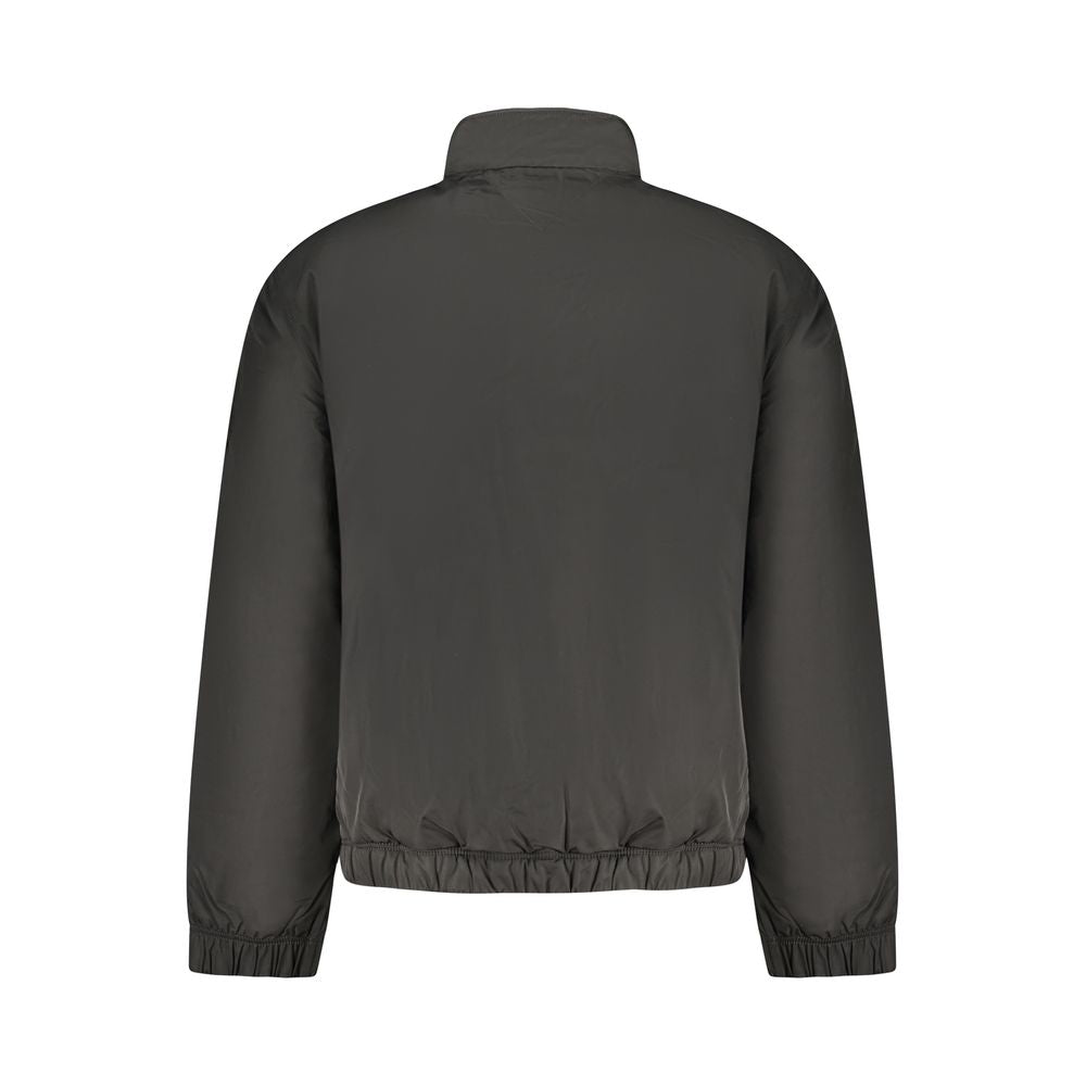 Veste noire en polyester pour homme de la marque Tommy Hilfiger, avec fermeture éclair et col montant.