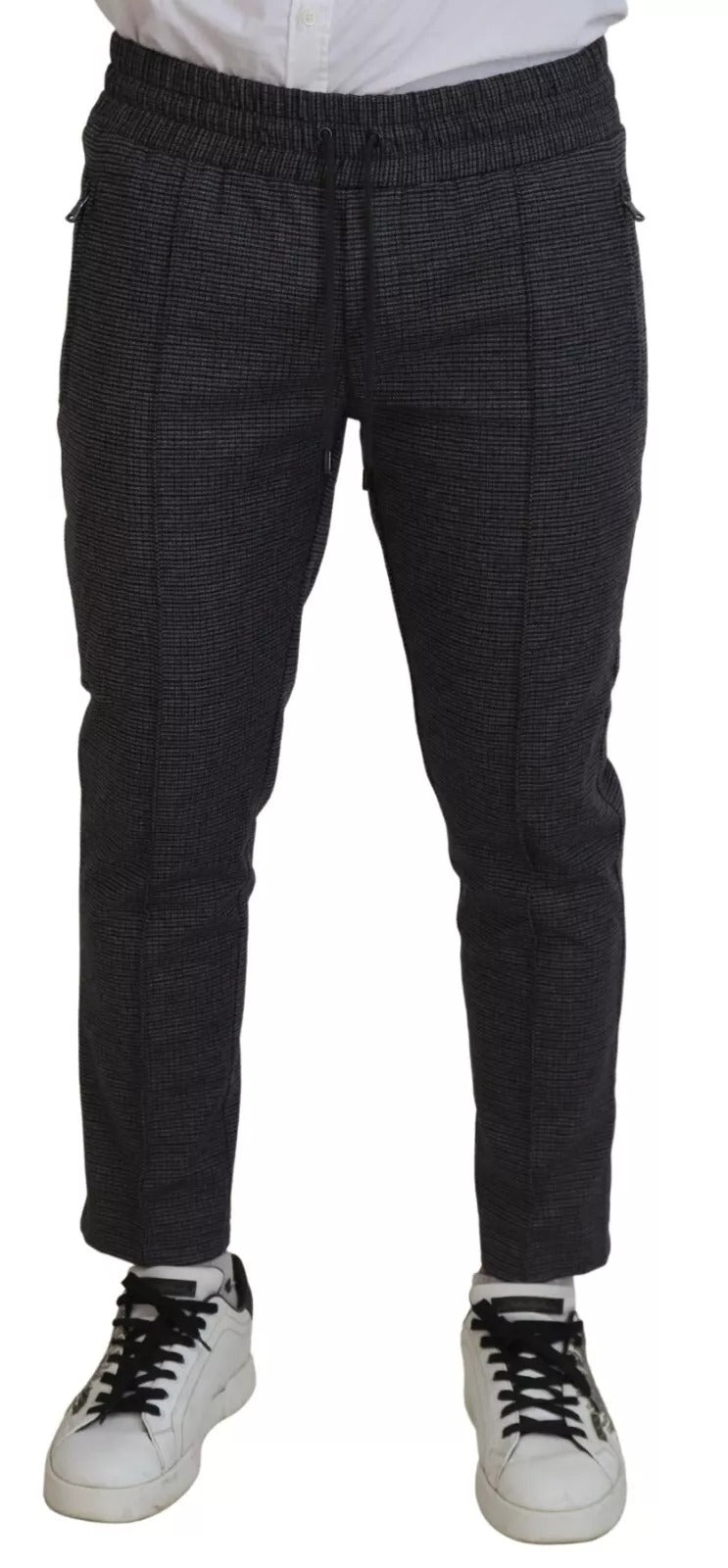 Pantalon skinny en laine à rayures grises de Dolce & Gabbana, pantalon élégant avec coupe ajustée et motif rayé.