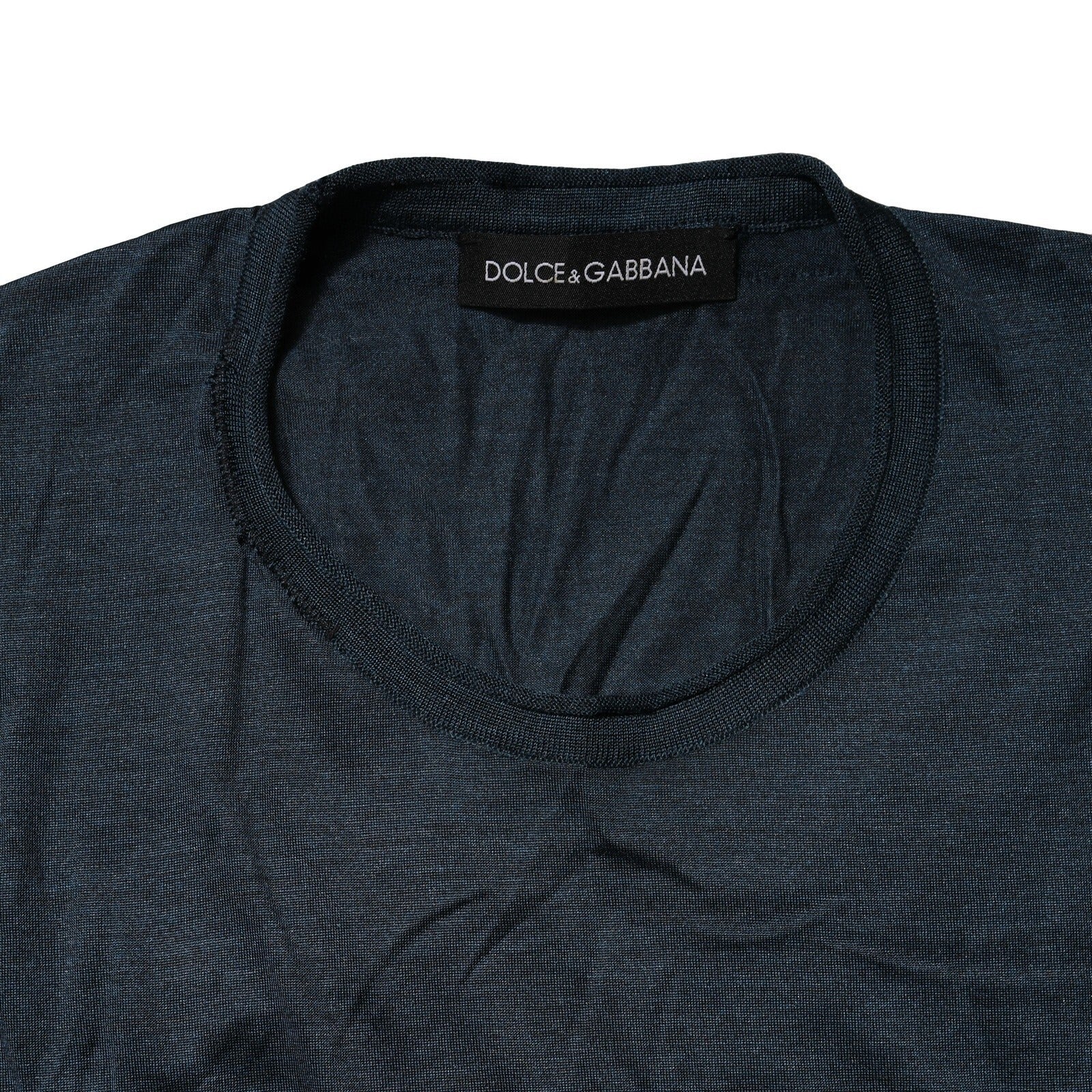 T-shirt en soie bleu foncé Dolce & Gabbana à col rond à manches courtes, vue de face.