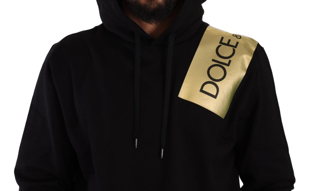 Pull à capuche pour homme Dolce & Gabbana en coton noir avec détails dorés, style décontracté et élégant.
