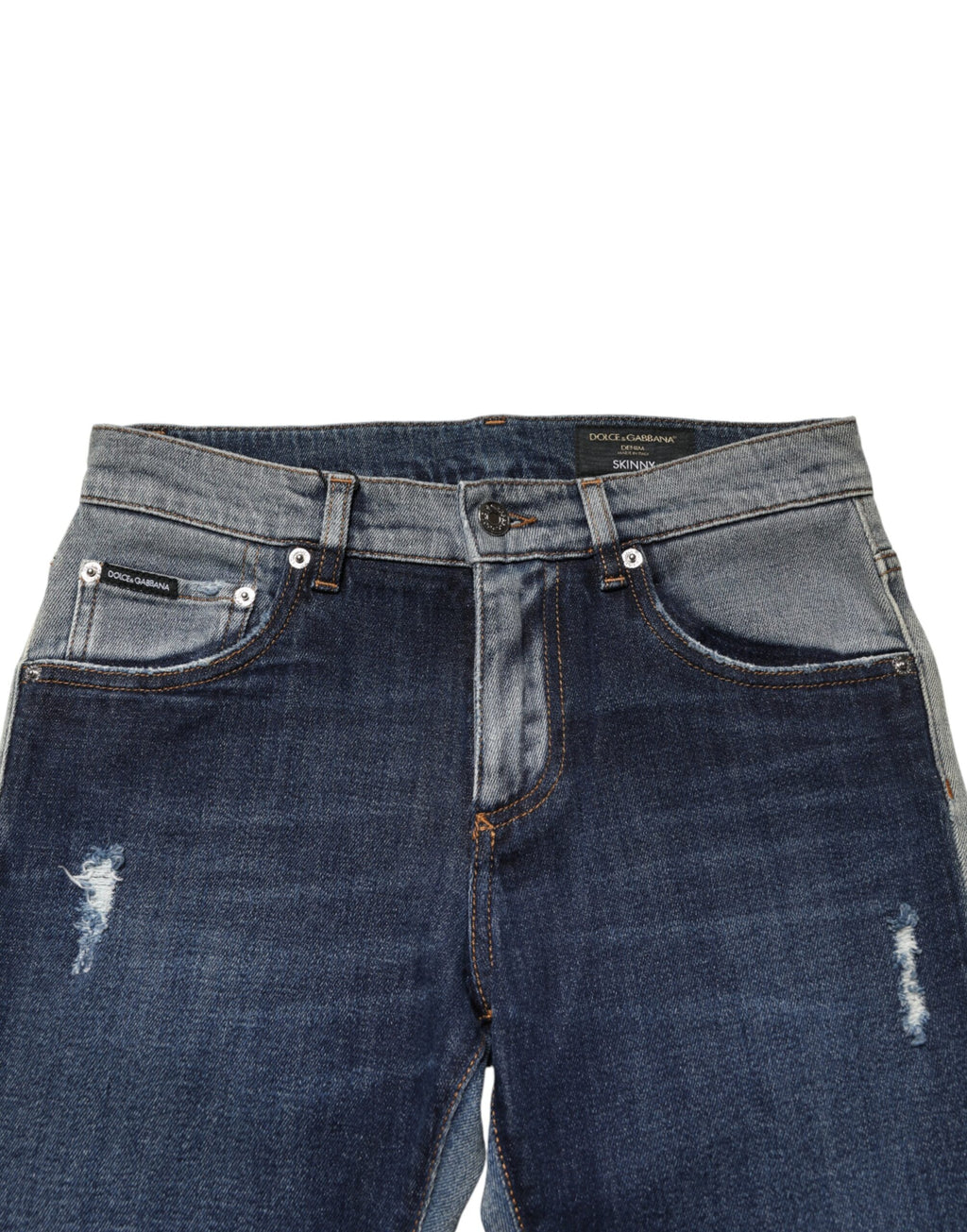 Jeans skinny en denim coton à deux tons bleu pour hommes de Dolce & Gabbana, visible avec détails de couture et coupe ajustée.