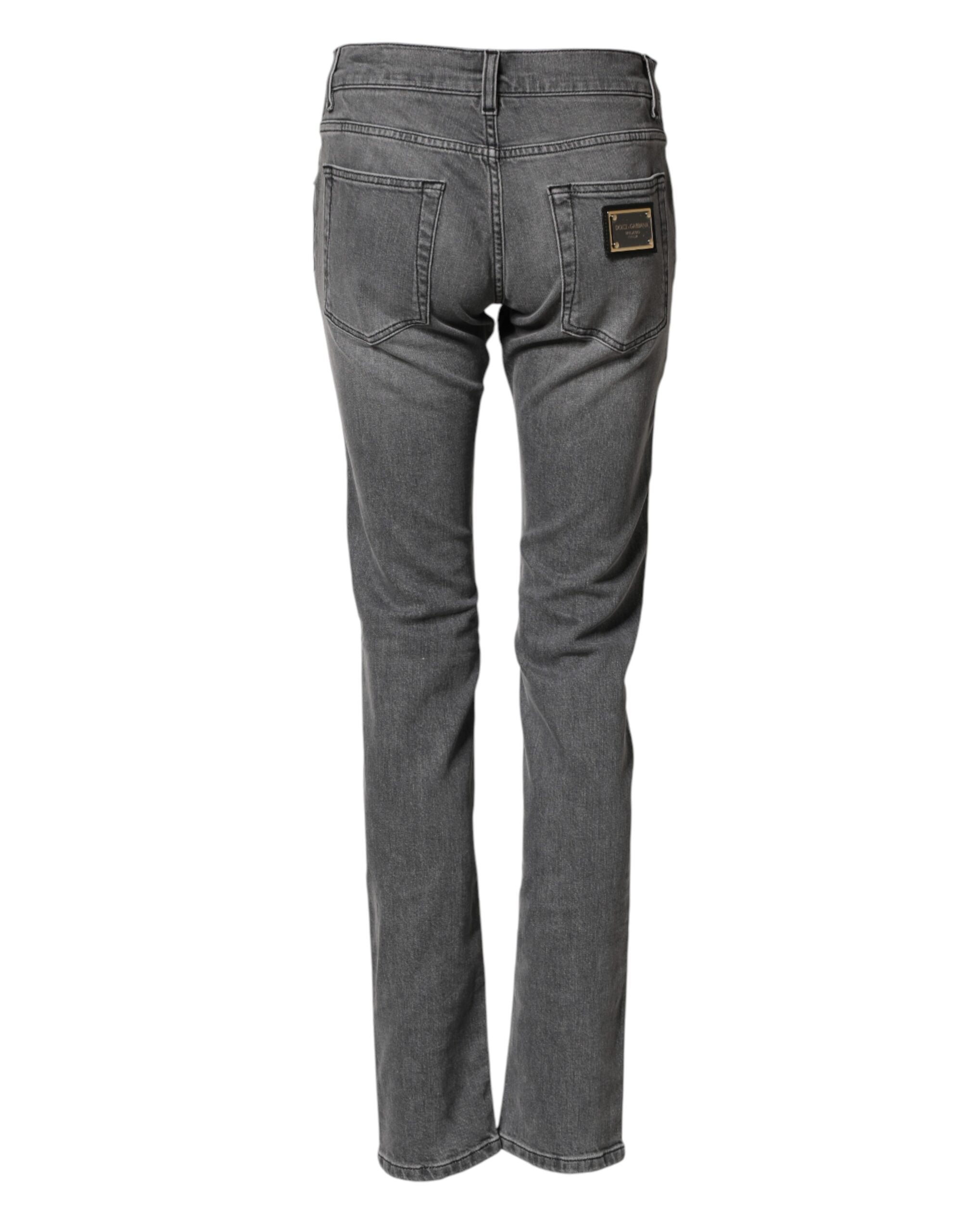 Jeans slim en coton gris de Dolce & Gabbana, taille mi-haute, coupe skinny, détails modernes et élégants.