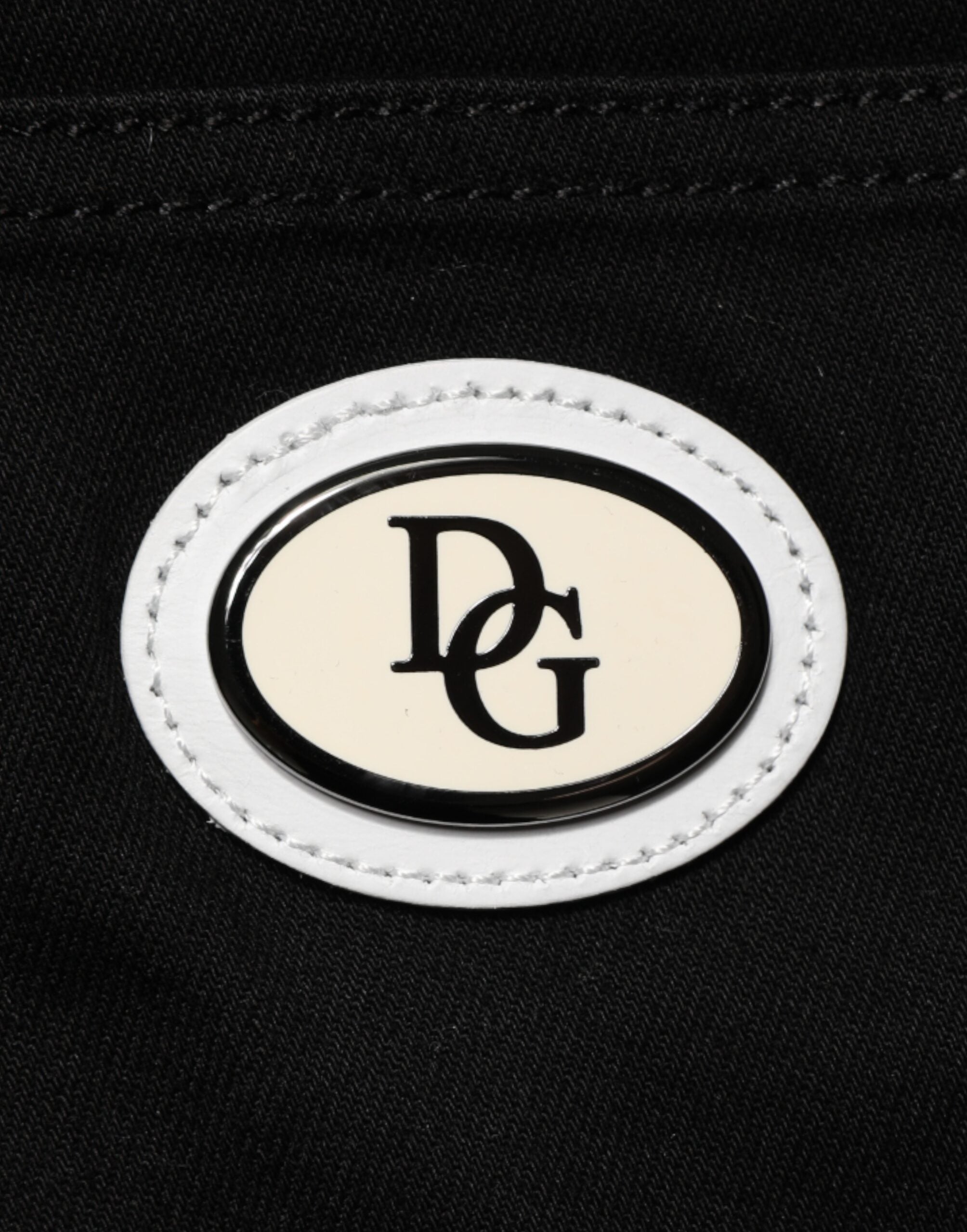 Jeans slim en denim noir Dolce & Gabbana, taille mi-hauteur, logo brodé, style skinny, en coton.