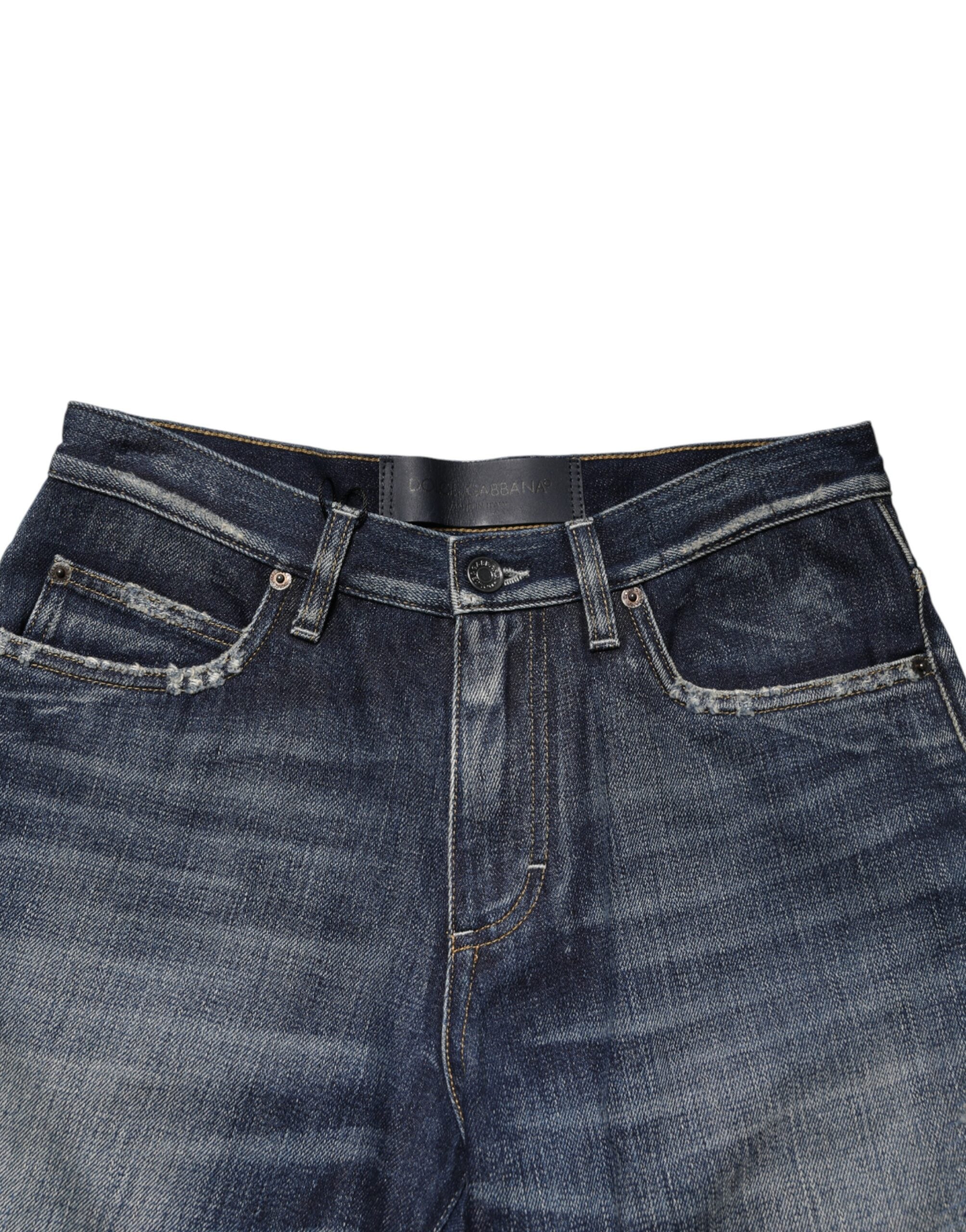 Shorts bermuda en denim bleu déchiré Dolce & Gabbana en coton, style décontracté et tendance.