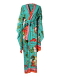 Robe longue à manches longues Dolce & Gabbana avec motif imprimé vert, style cache-coeur élégante et sophistiquée.