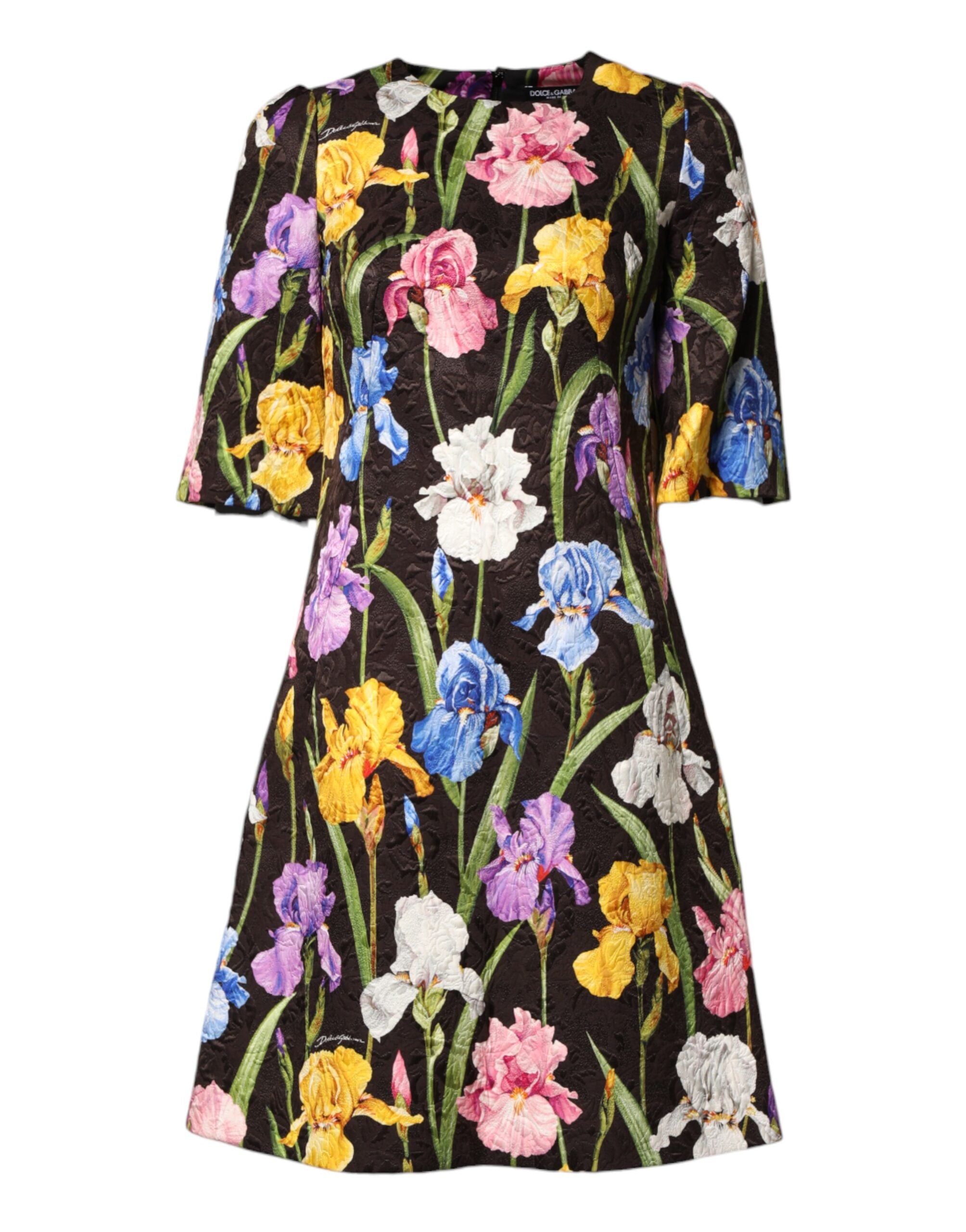 Robe courte en brocart noir à fleurs de Dolce & Gabbana, coupe évasée en ligne A, détails élégants et sophistiqués.