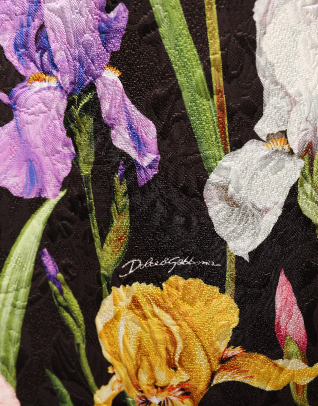 Robe courte en brocart floral noir de Dolce & Gabbana, coupe évasée en ligne A, détails élégants et sophistiqués.