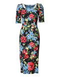 Robe midi noire Dolce & Gabbana à imprimé floral en viscose, coupe fourreau élégante et moderne.
