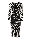 Robe midi noire et blanche en viscose à motif zèbre de Dolce & Gabbana, coupe ajustée et élégante.