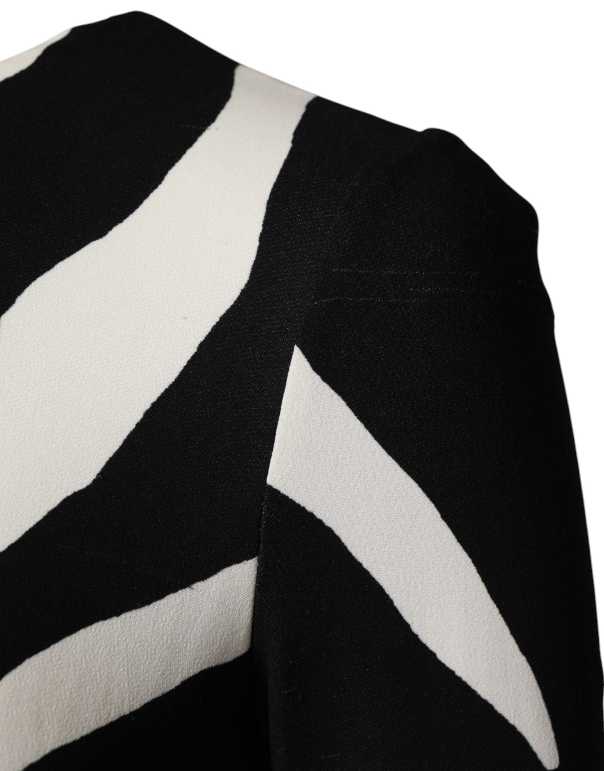 Robe midi Dolce & Gabbana en viscose noire et blanche avec motif zèbre, coupe ajustée et élégante.