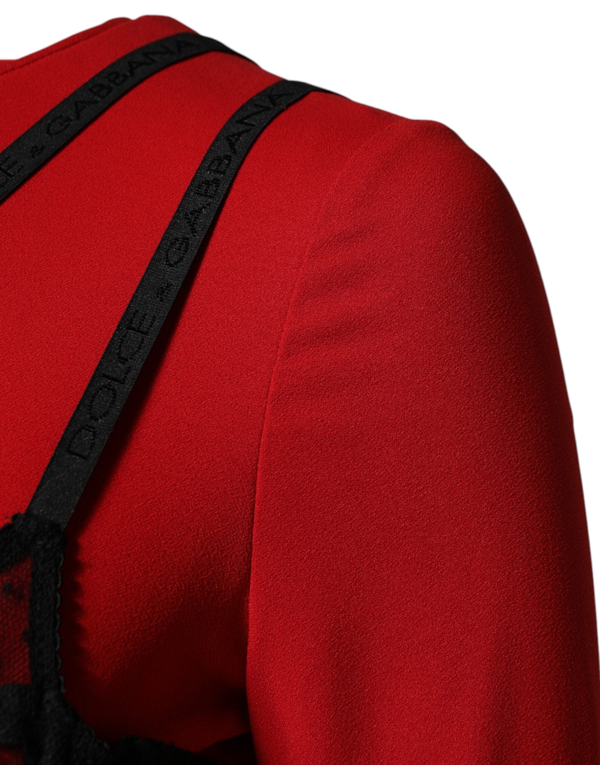 Robe midi Dolce & Gabbana noire et rouge avec contraste, en coton, style élégant avec décolleté et détails sophistiqués.