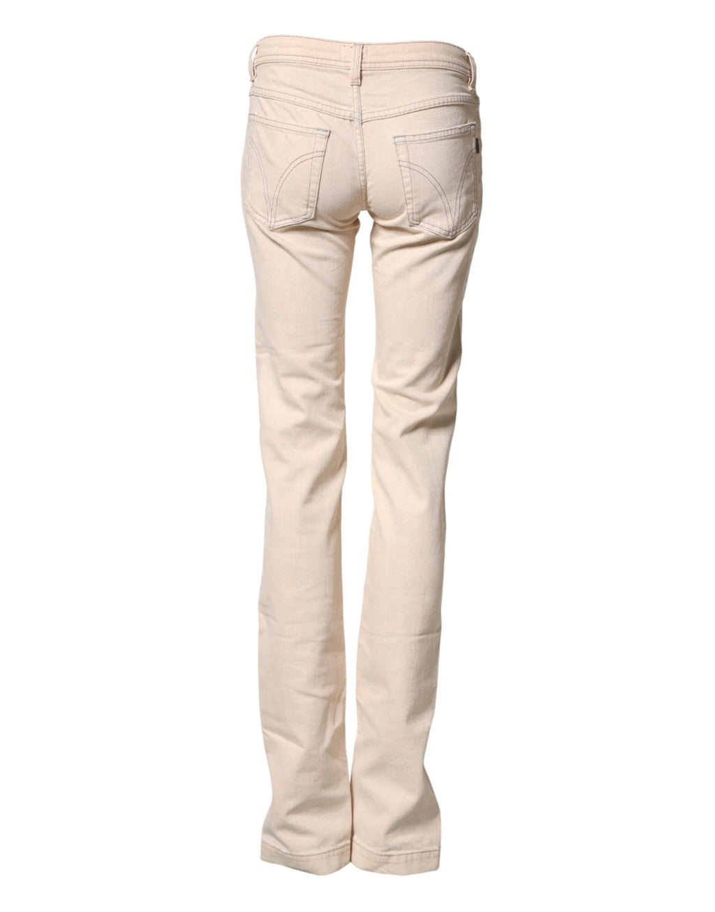 Pantalon en jean beige à taille basse, coupe slim en coton de la marque Dolce & Gabbana, visible en détail sur la photo.