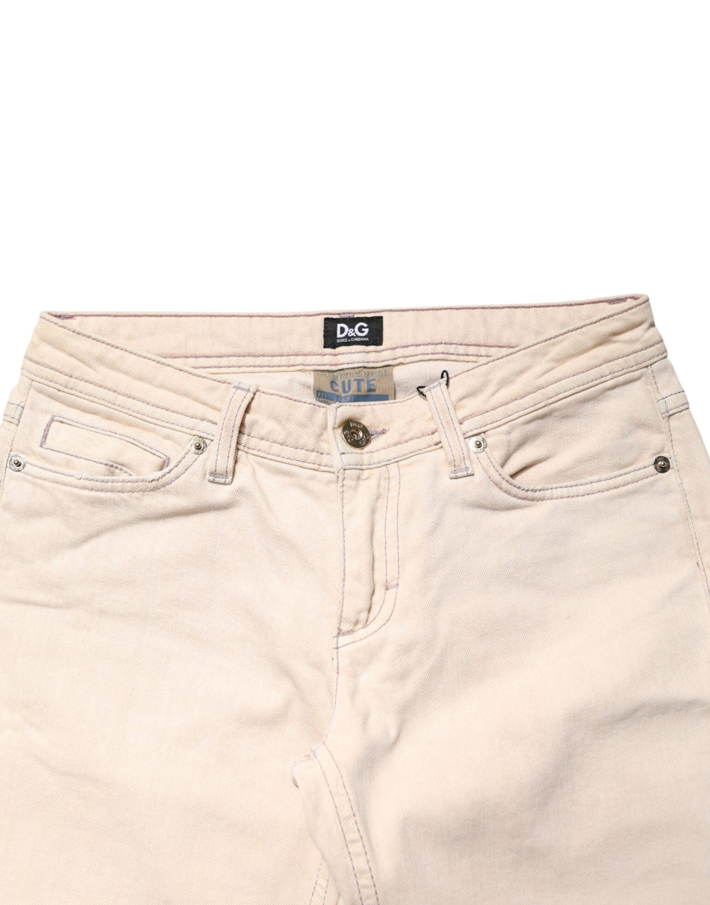 Jeans Dolce & Gabbana beige en coton, taille basse, coupe slim, pantalons en denim pour homme, visibles sur l'image.