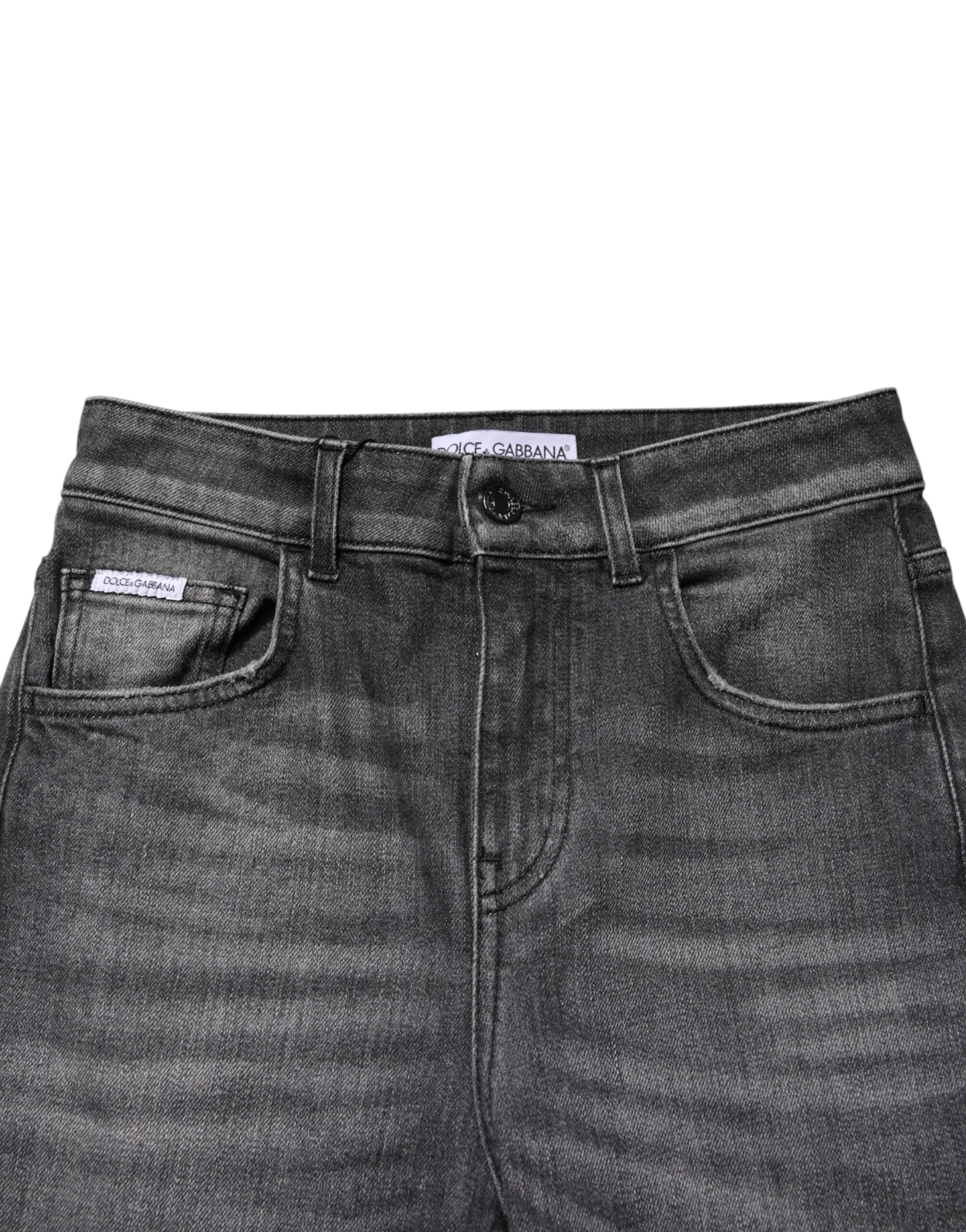 Jean skinny en denim gris à taille haute de Dolce & Gabbana, coupe ajustée en coton, visible avec détails de couture.