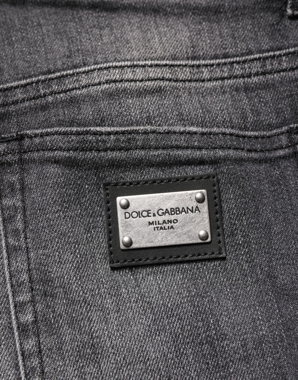 Jeans skinny en denim gris à taille haute de Dolce & Gabbana, coupe ajustée en coton pour un style élégant.