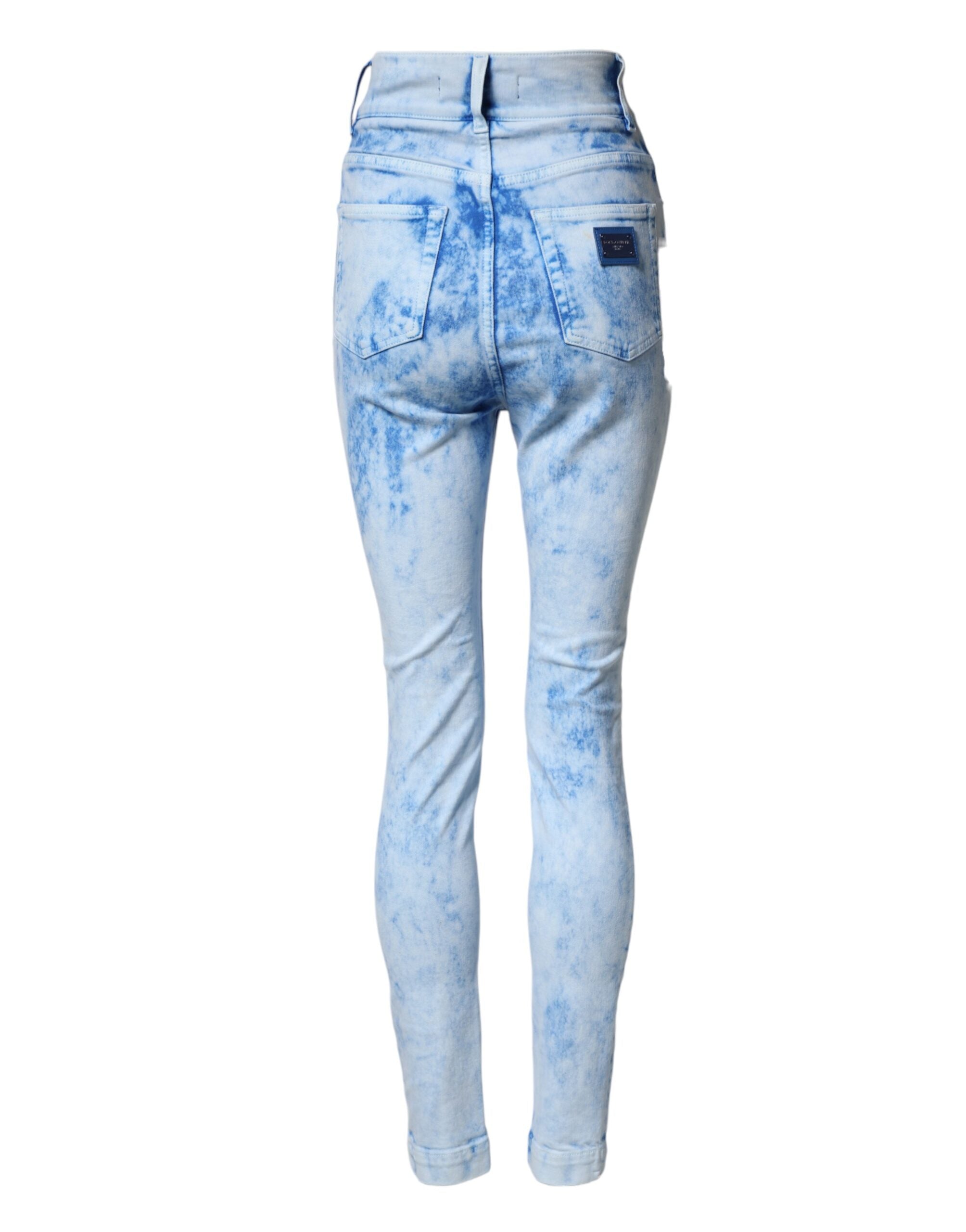 Jeans skinny taille haute Dolce & Gabbana Light Blue en denim bleu clair, affichés sur un mannequin.