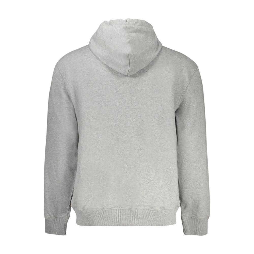 Sweat-shirt gris en coton pour homme de la marque Calvin Klein, style décontracté avec logo discret sur la poitrine.
