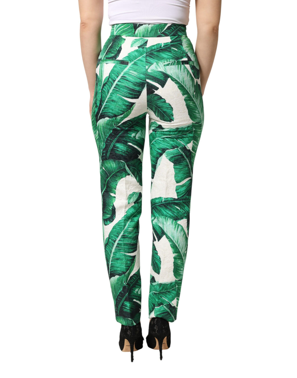 Pantalon blanc et vert Dolce & Gabbana à taille haute avec motif de feuilles, pantalon tendance et élégant pour femme.