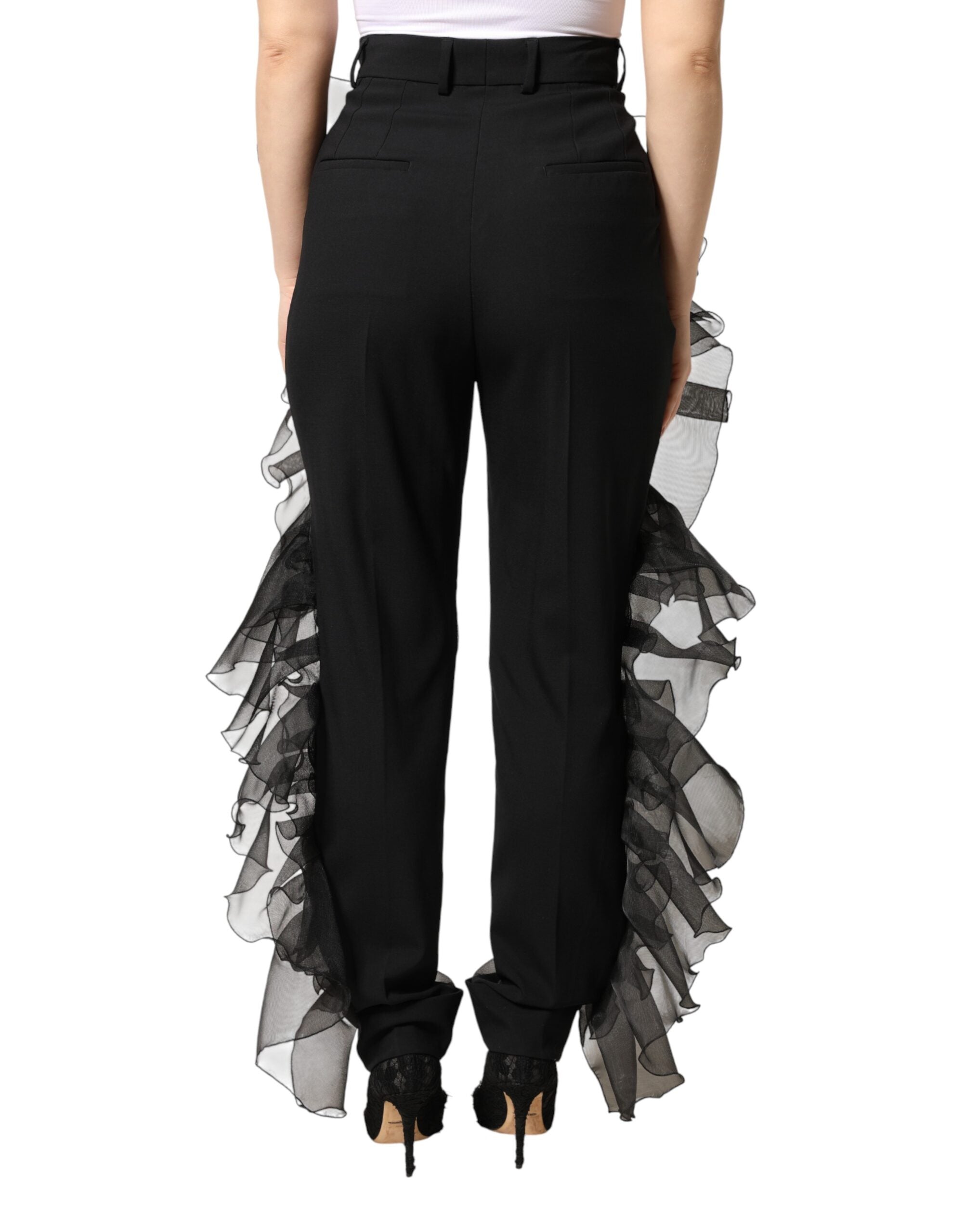 Pantalon en laine noire Dolce & Gabbana à taille haute et en tulle, élégant et sophistiqué, visible sur la photo.