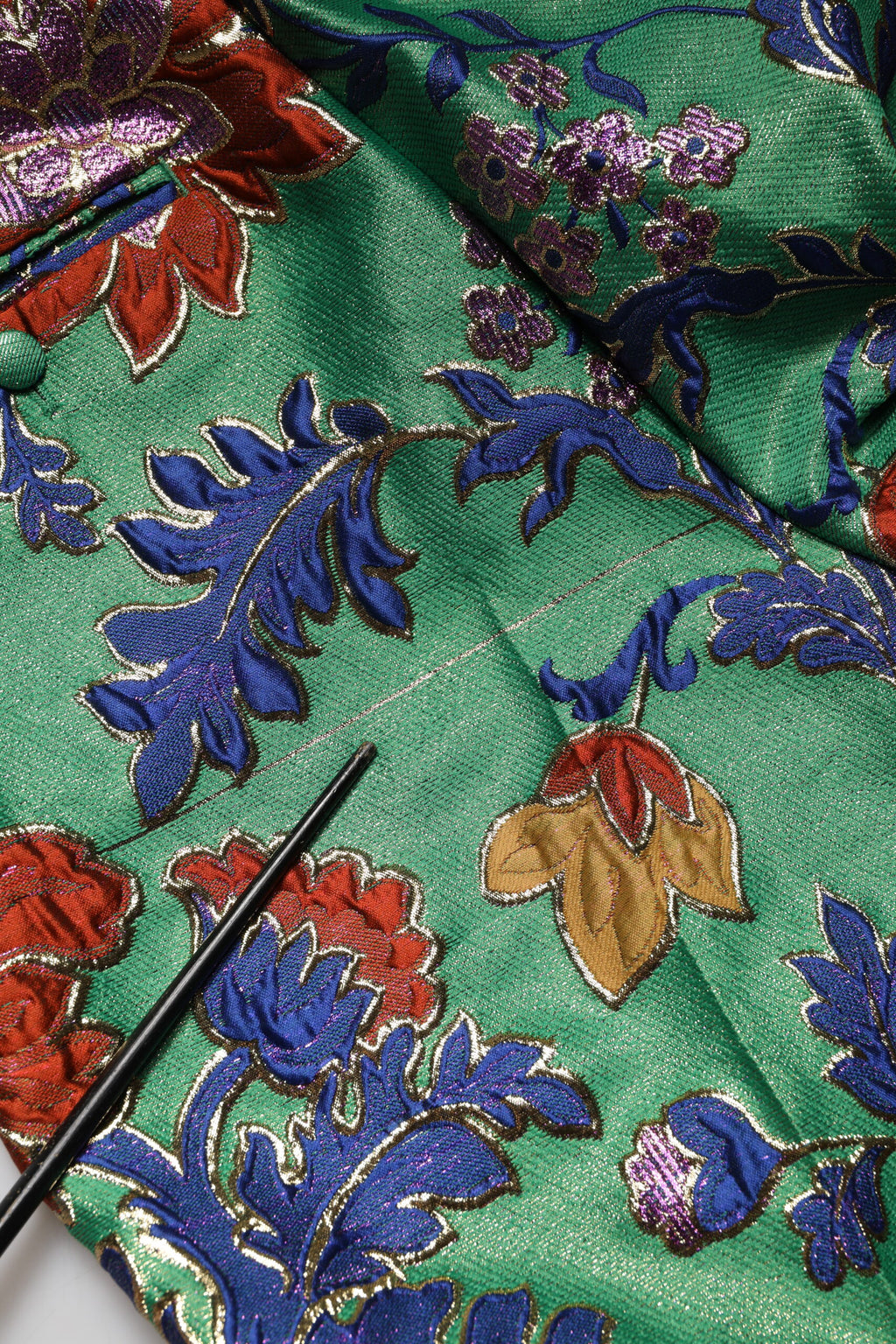 Pantalon bootcut en polyester vert à fleurs de Dolce & Gabbana, style élégant avec motif floral vibrant.