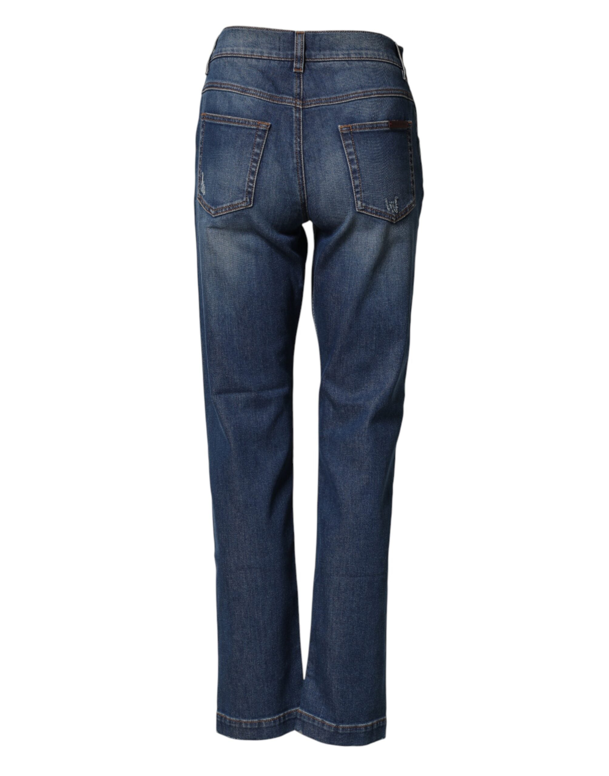 Jeans boyfriend en denim bleu avec broderies florales Dolce & Gabbana, style décontracté et détails élégants.