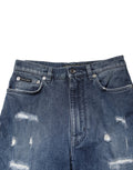 Jeans en denim bleu Dolce & Gabbana GRACE délavé avec logo, style déchiré et usé, pour un look casual et tendance.