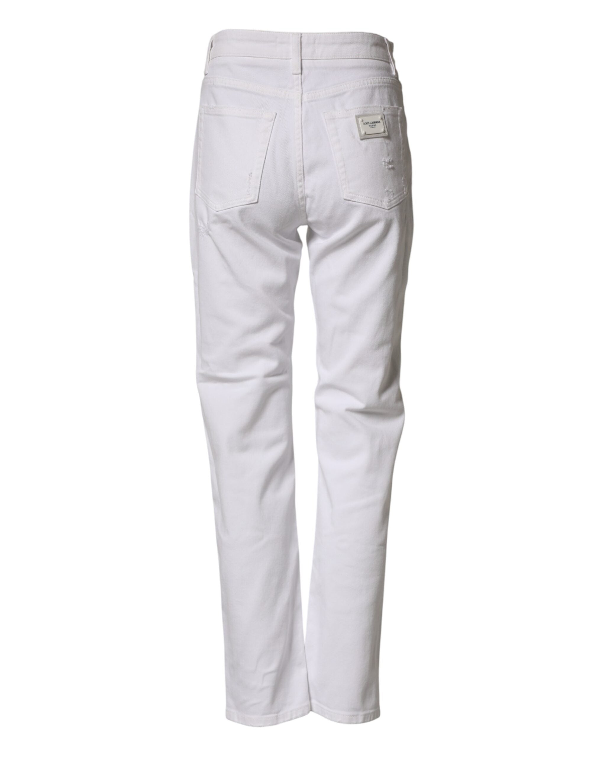 Jeans boyfriend en coton blanc déchiré de Dolce & Gabbana, style décontracté et tendance, visible en détail sur l'image.