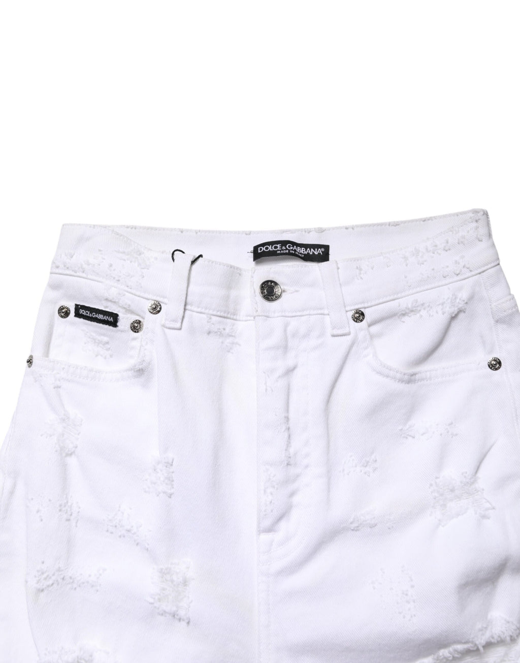 Jeans en denim blanc déchiré à taille haute de Dolce & Gabbana, style décontracté et tendance, visible en gros plan.