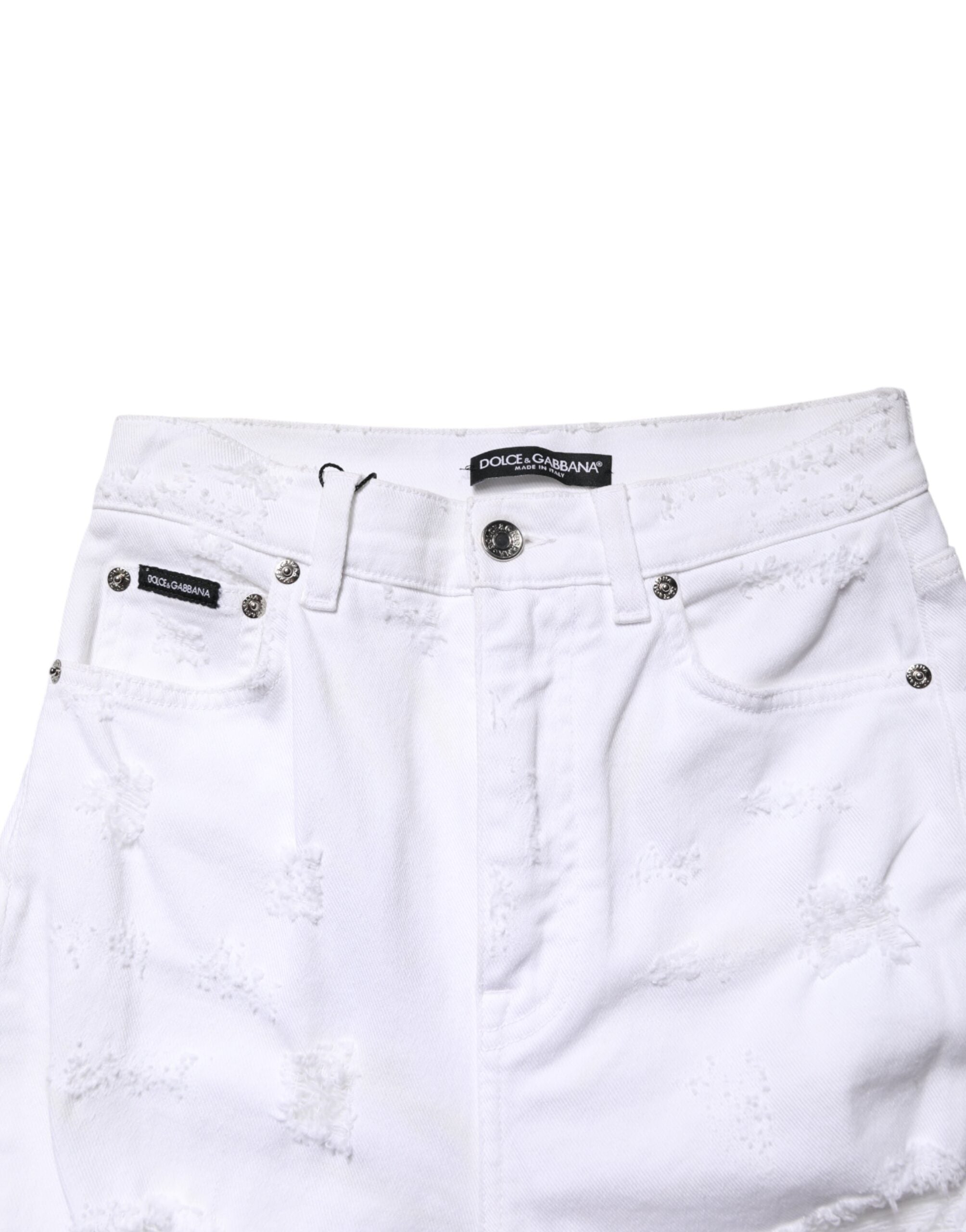 Jeans en denim blanc déchiré à taille haute de Dolce & Gabbana, style décontracté et tendance, visible en gros plan.