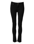 Jeans skinny en coton noir Dolce & Gabbana avec taille mi-haute, détails en denim, visibles sur le produit.