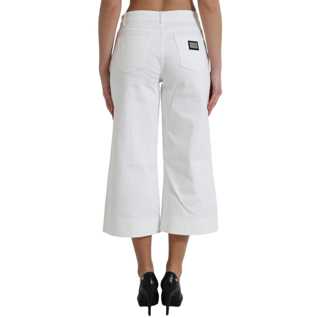 Jeans en denim blanc coupe large de Dolce & Gabbana, pantalon court en coton avec jambes larges.