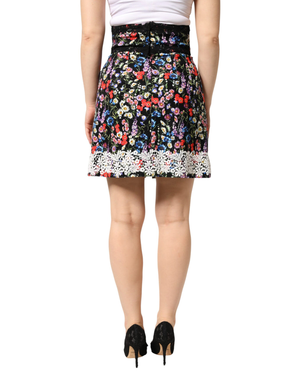 Jupon noir en dentelle florale coton Dolce & Gabbana, jupe courte taille haute élégante et féminine.