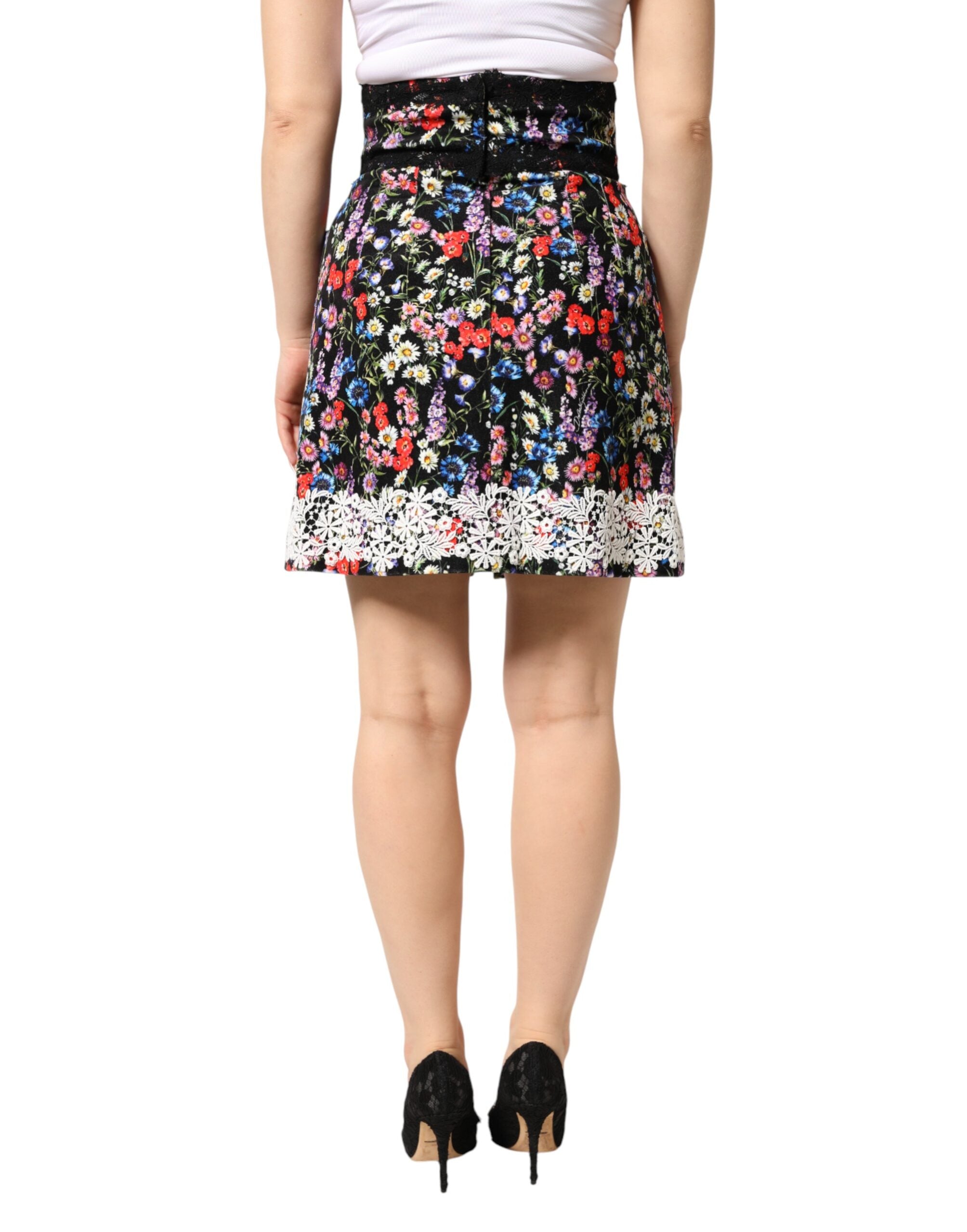 Jupon noir en dentelle florale coton Dolce & Gabbana, jupe courte taille haute élégante et féminine.