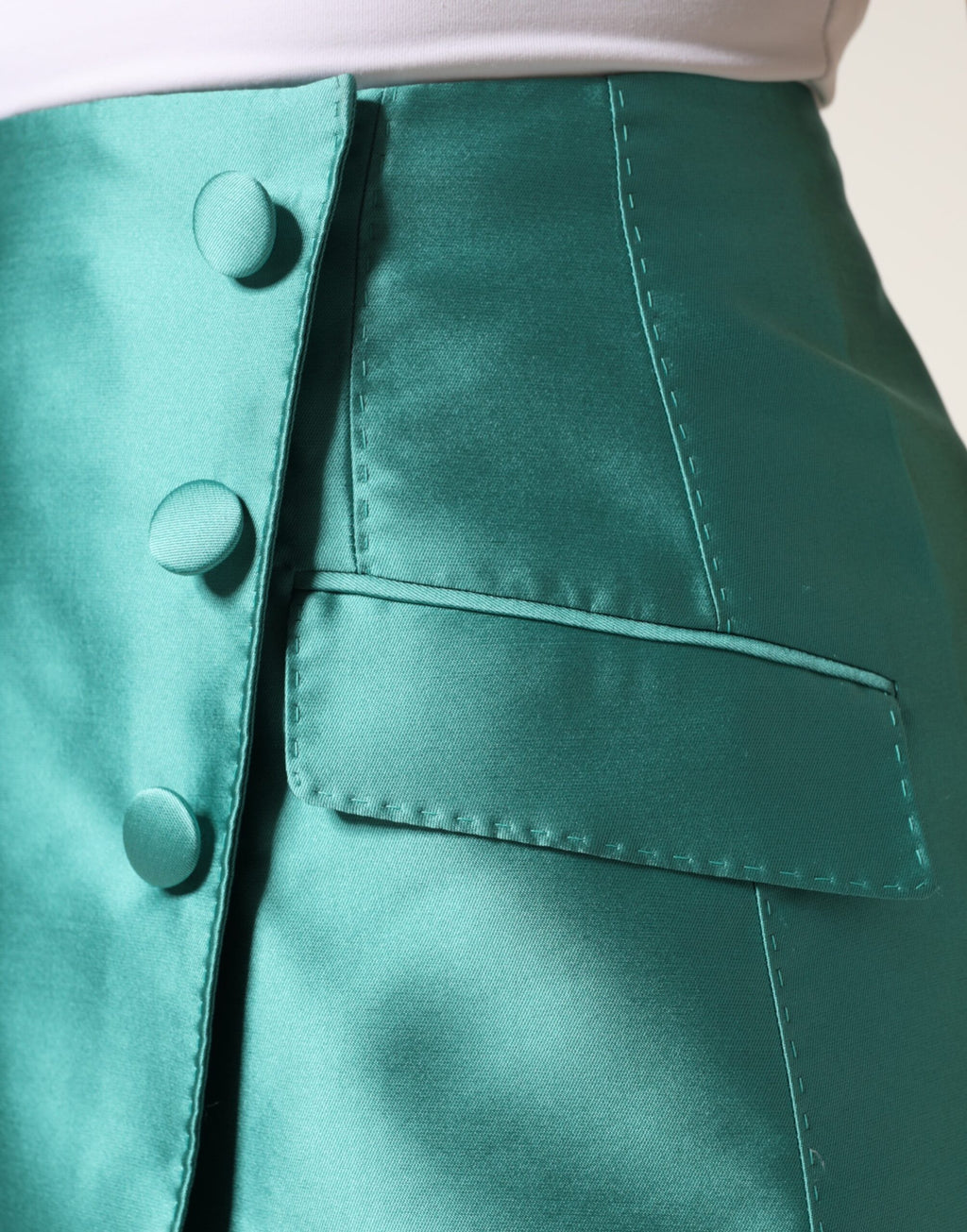 Mini jupe haute taille en polyester vert de Dolce & Gabbana avec boutons, style élégant et moderne.