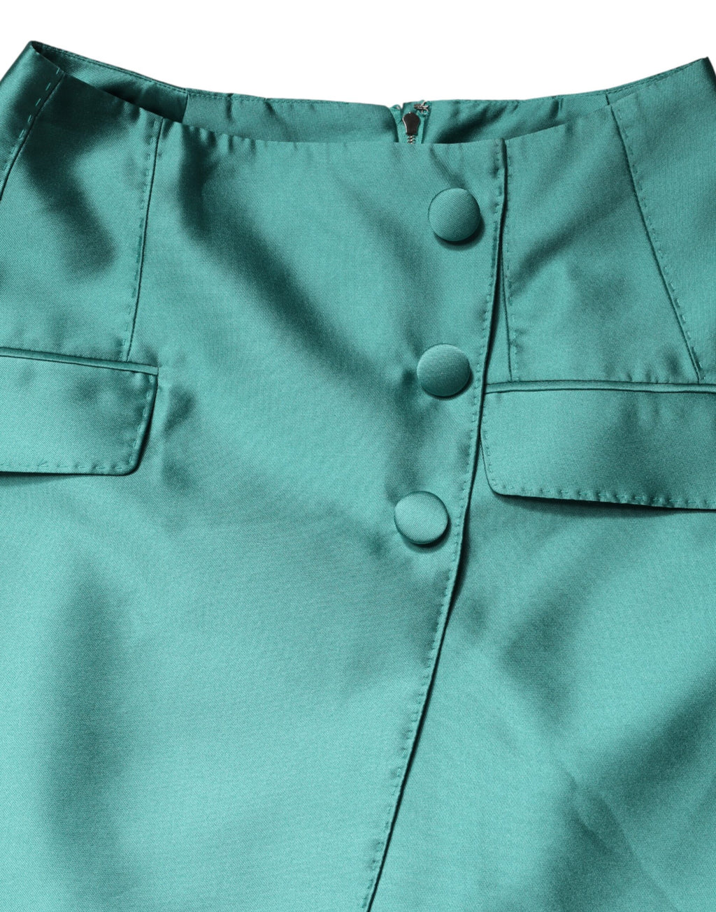 Jupe courte en polyester vert Dolce & Gabbana à taille haute avec boutons, style élégant et moderne.