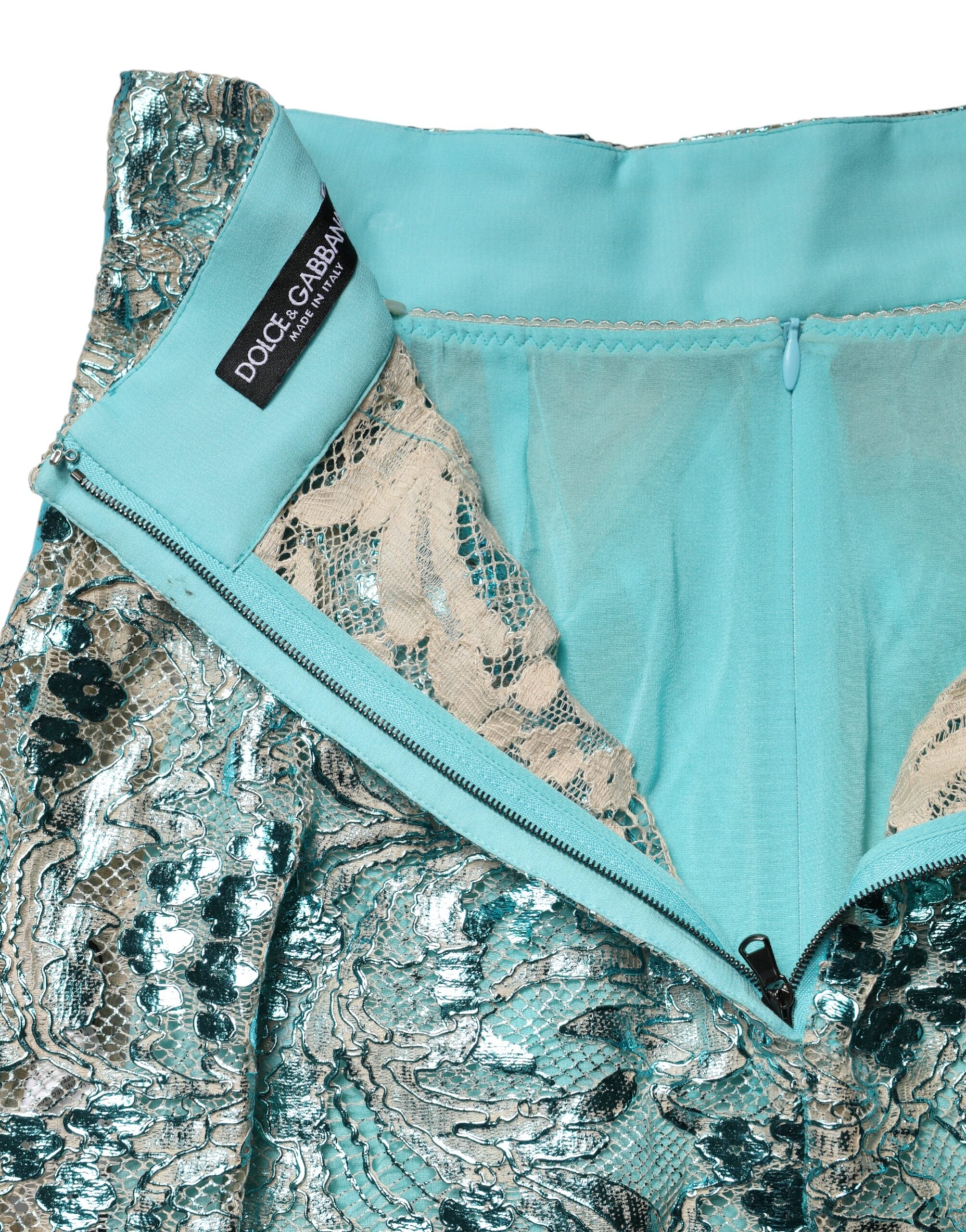 Mini jupe Dolce & Gabbana en brocart bleu à taille haute avec motif floral, élégante et tendance.