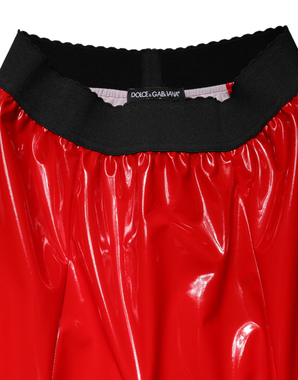 Jupe midi en polyester rouge brillant à taille haute de Dolce & Gabbana, élégante et tendance.
