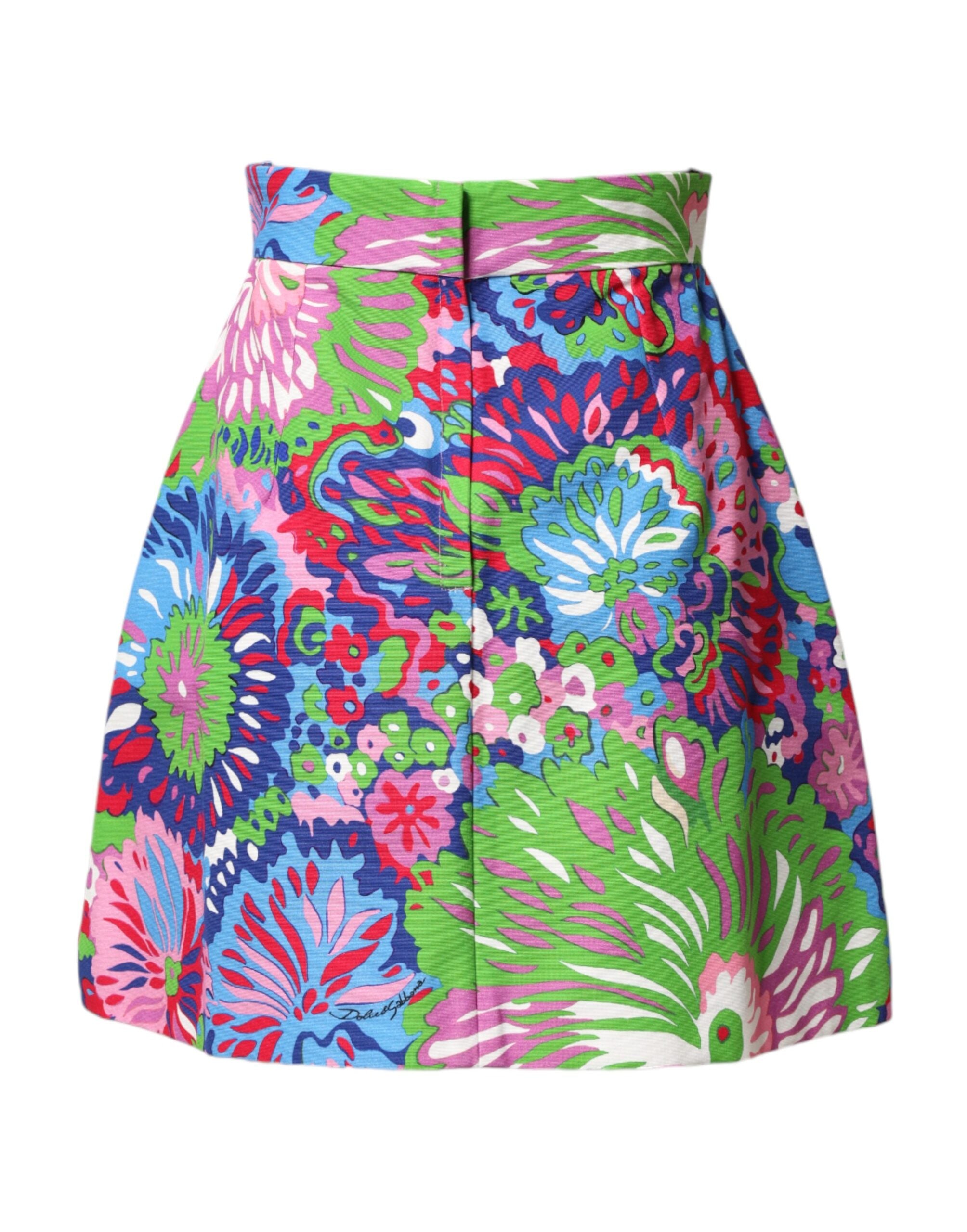 Shorts à fleurs multicolores Dolce & Gabbana, taille haute, boutonnée, style mini, mode féminine élégante et tendance.