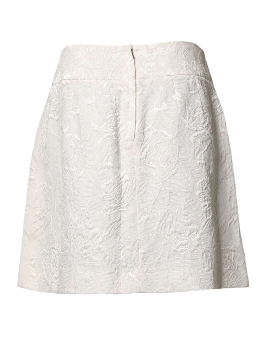 Jupe courte blanche en brocart floral Dolce & Gabbana à taille haute, visible avec détails de tissu et motif floral.